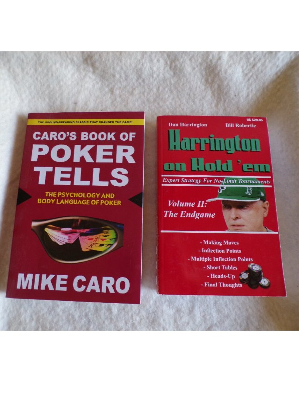 Two of the best poker books Harrington on Hold'em vol II and Caros book of Tells